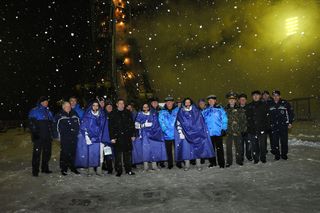 Expedition 29 Crew and Officials Pose in the Snow