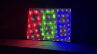 A section of an RGB backlit mini-LED panel, showing the letters R, G and B lit up in red, green and blue respectively