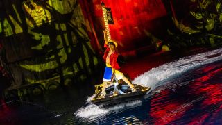 Luffy from One Piece riding on a boat during Universal Fan Fest's Grand Pirate Show