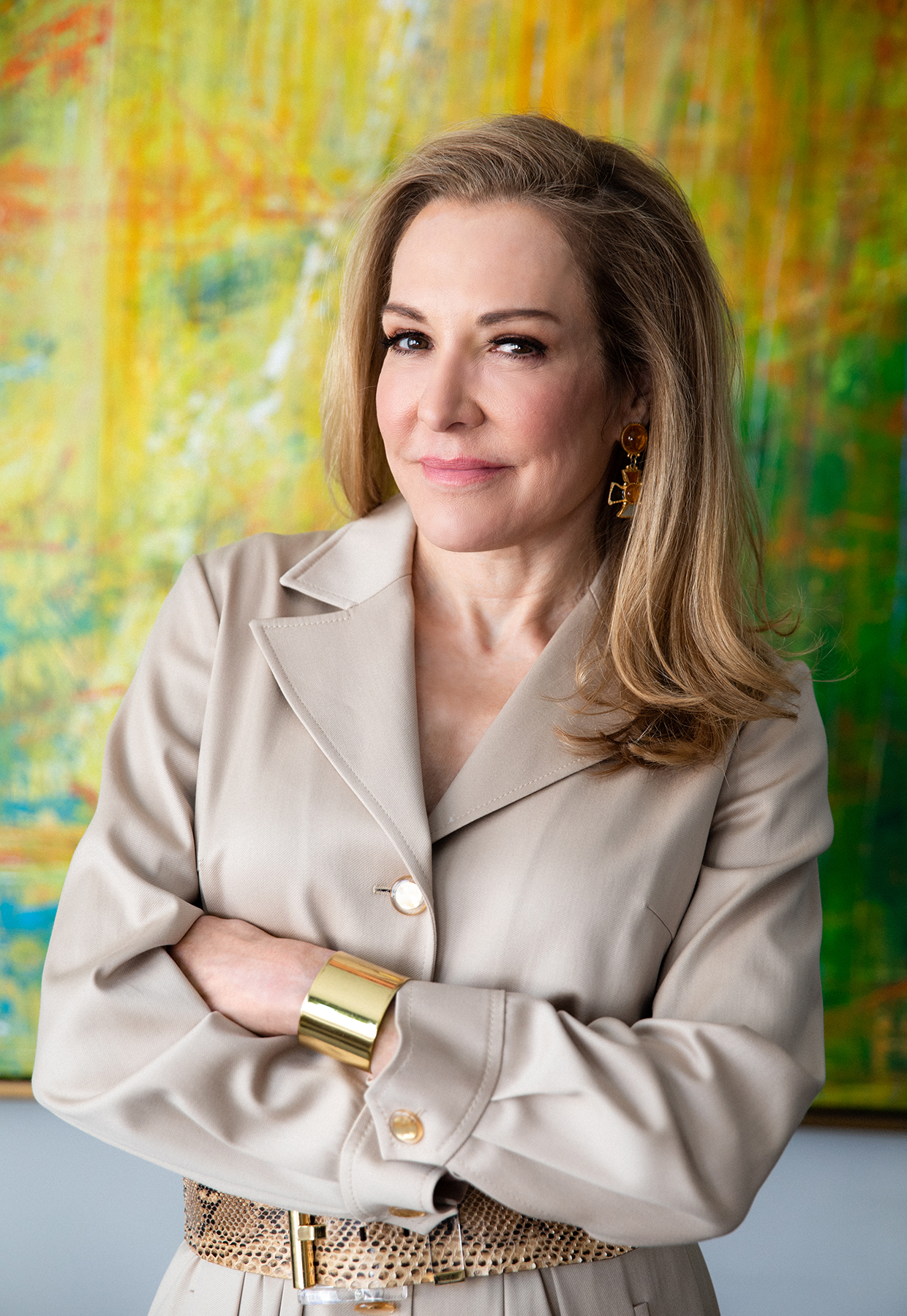 Dr. Cheryl Karcher in a tan suit and gold jewelry