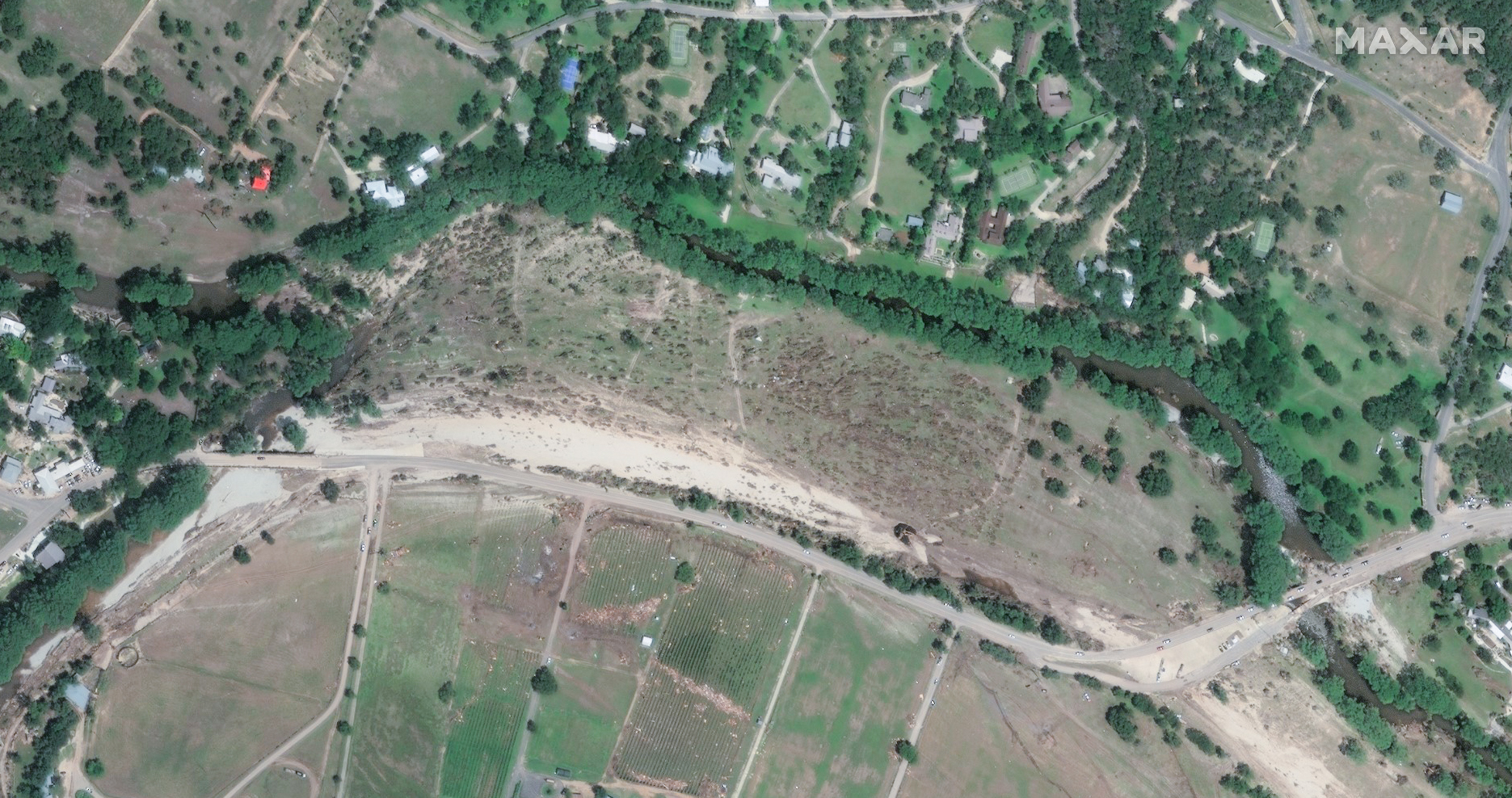 A satellite photograph of washed-out vegetation beside the Guadalupe River on July 8, after the flooding.