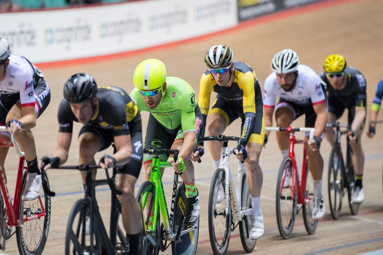 Andy Tennant sits in the group