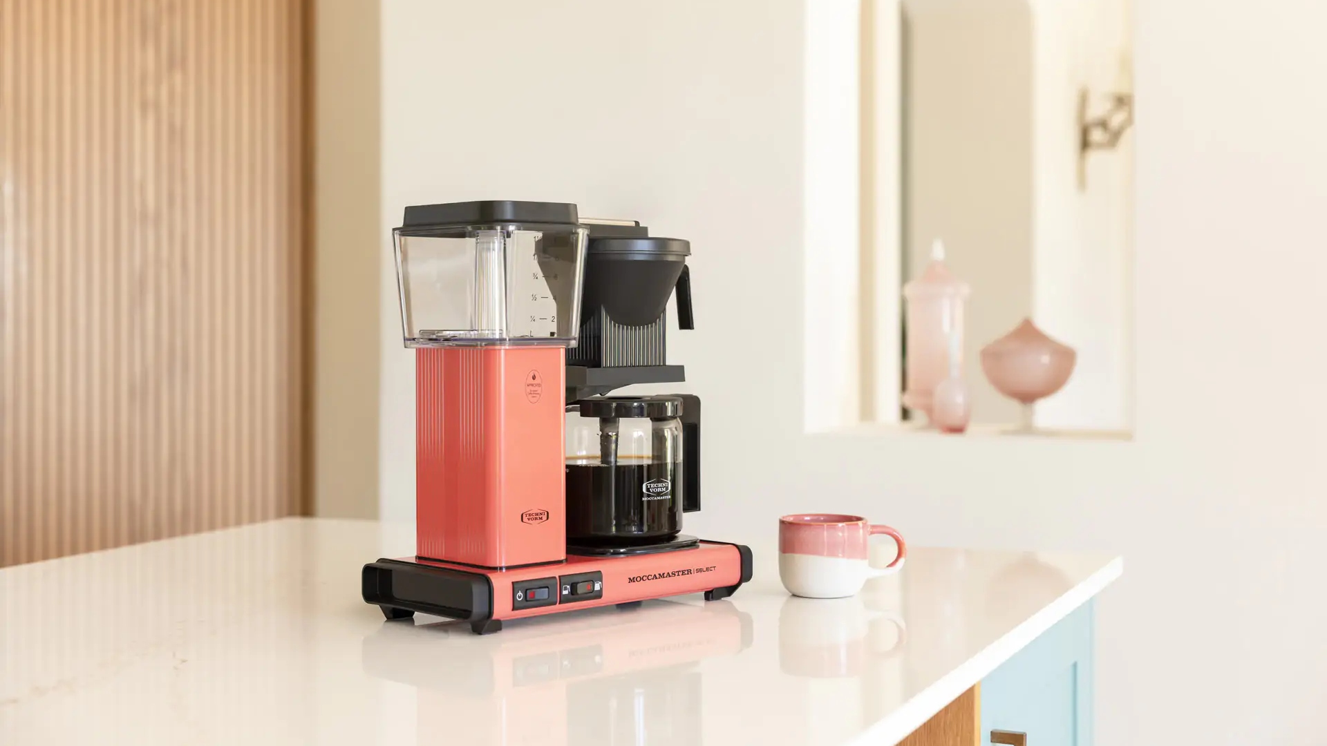 The Moccamaster in Sorbet on a kitchen counter