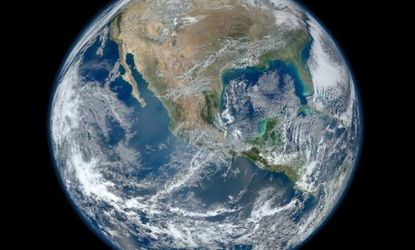 NASA's new "Blue Marble" image is a digital composite of several photos taken by a satellite as it zoomed around the Earth four times on January 4.