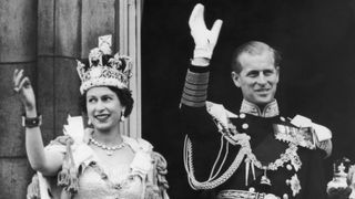 permanent bank holiday - Queen Elizabeth II and the Duke of Edinburgh wave at the crowds from the balcony at Buckingham Palace after Elizabeth's coronation, 2nd June 1953.