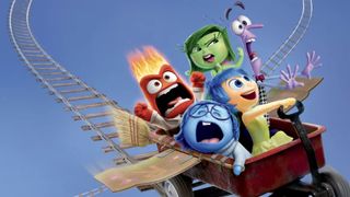 Five Disney and Pixar characters ride inside a kart suspended in the air on tracks