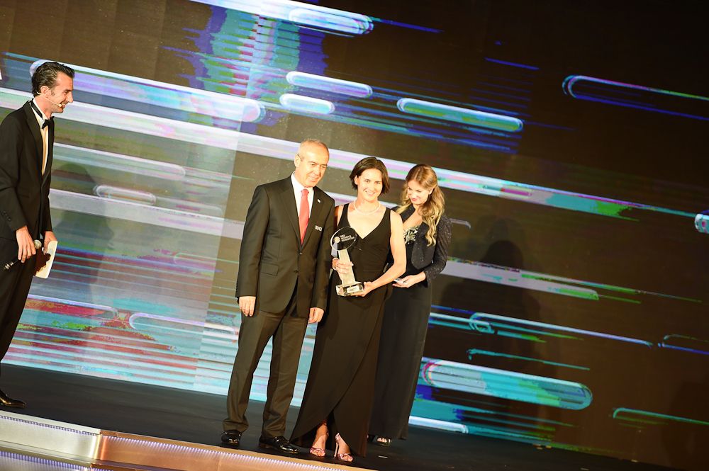 2016 Women's WorldTour winner Megan Guarnier collects her trophy at the annual UCI Gala