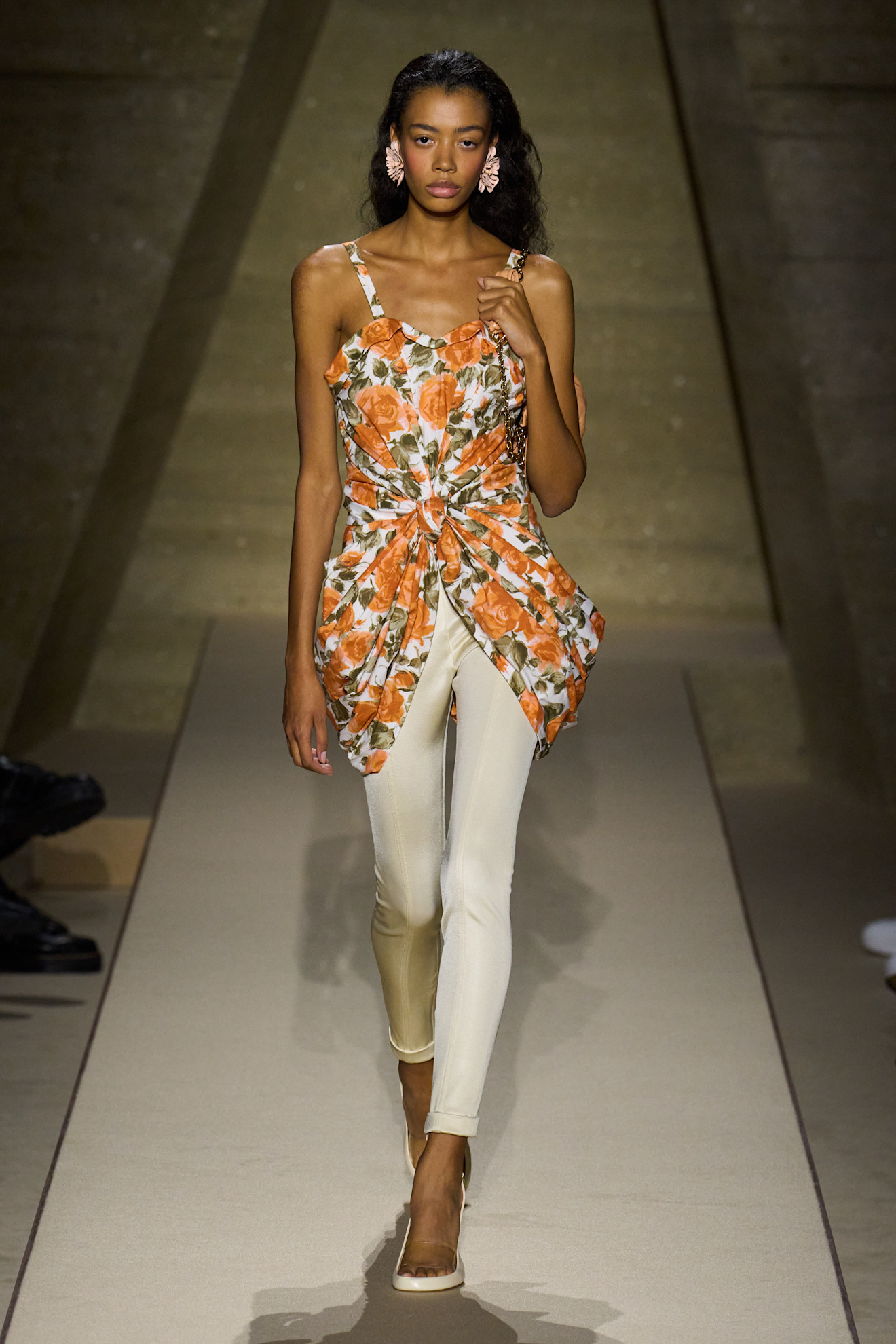 Model wears a floral top and leggings on the Chlo&amp;eacute; Spring Summer 2026 runway