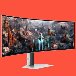 An ultrawide gaming monitor on a colourful background.
