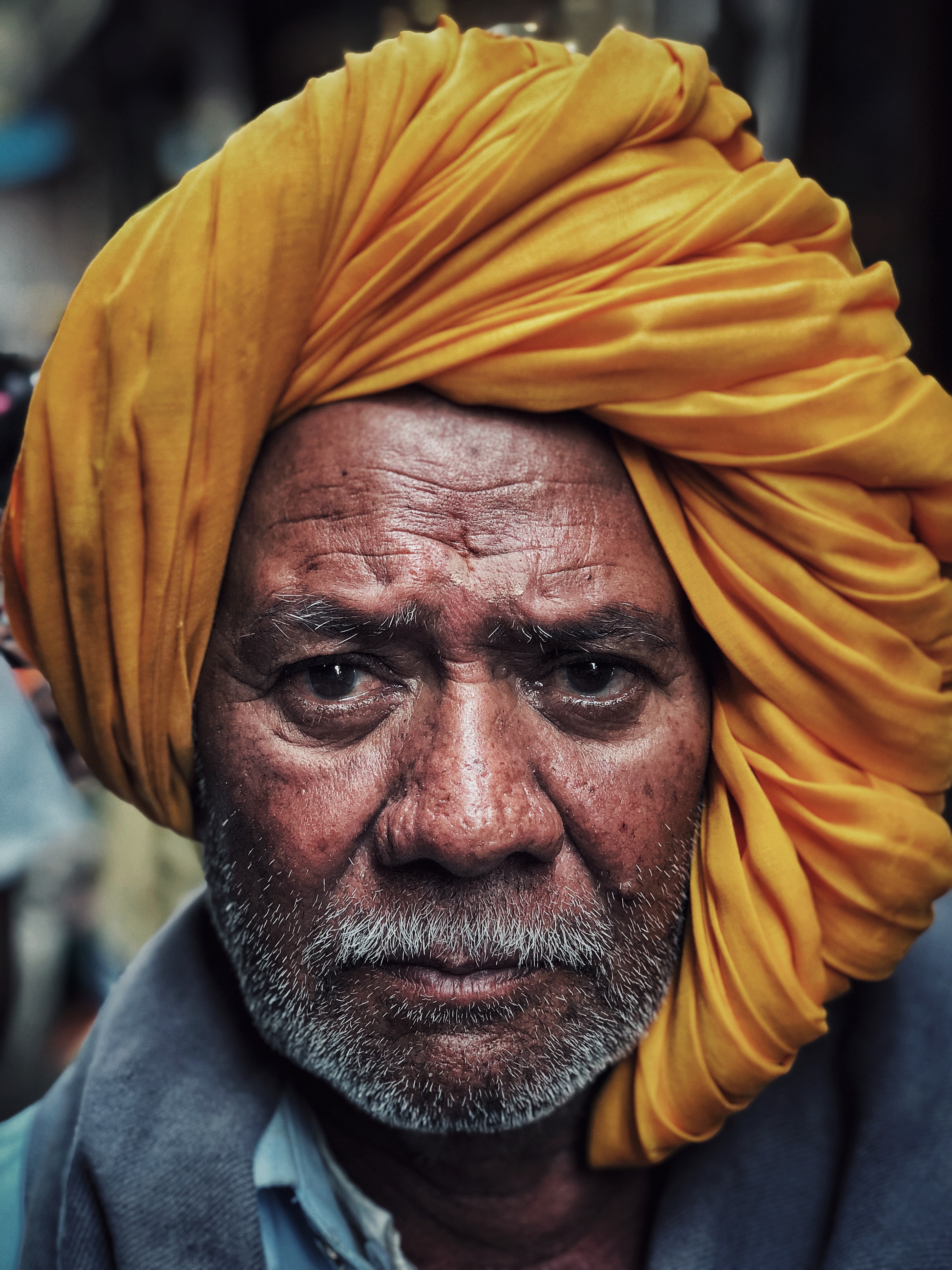 A man with a yellow turban