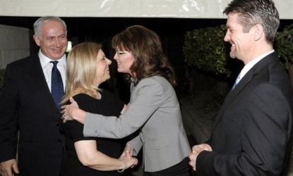 Sarah Palin greets Sarah Netanyahu and Israeli Prime Minister Benjamin Netanyahu Monday.