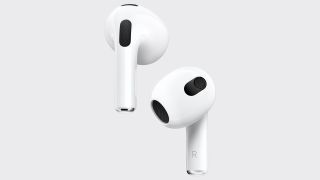 A pair of Apple AirPods 3 next to each other.