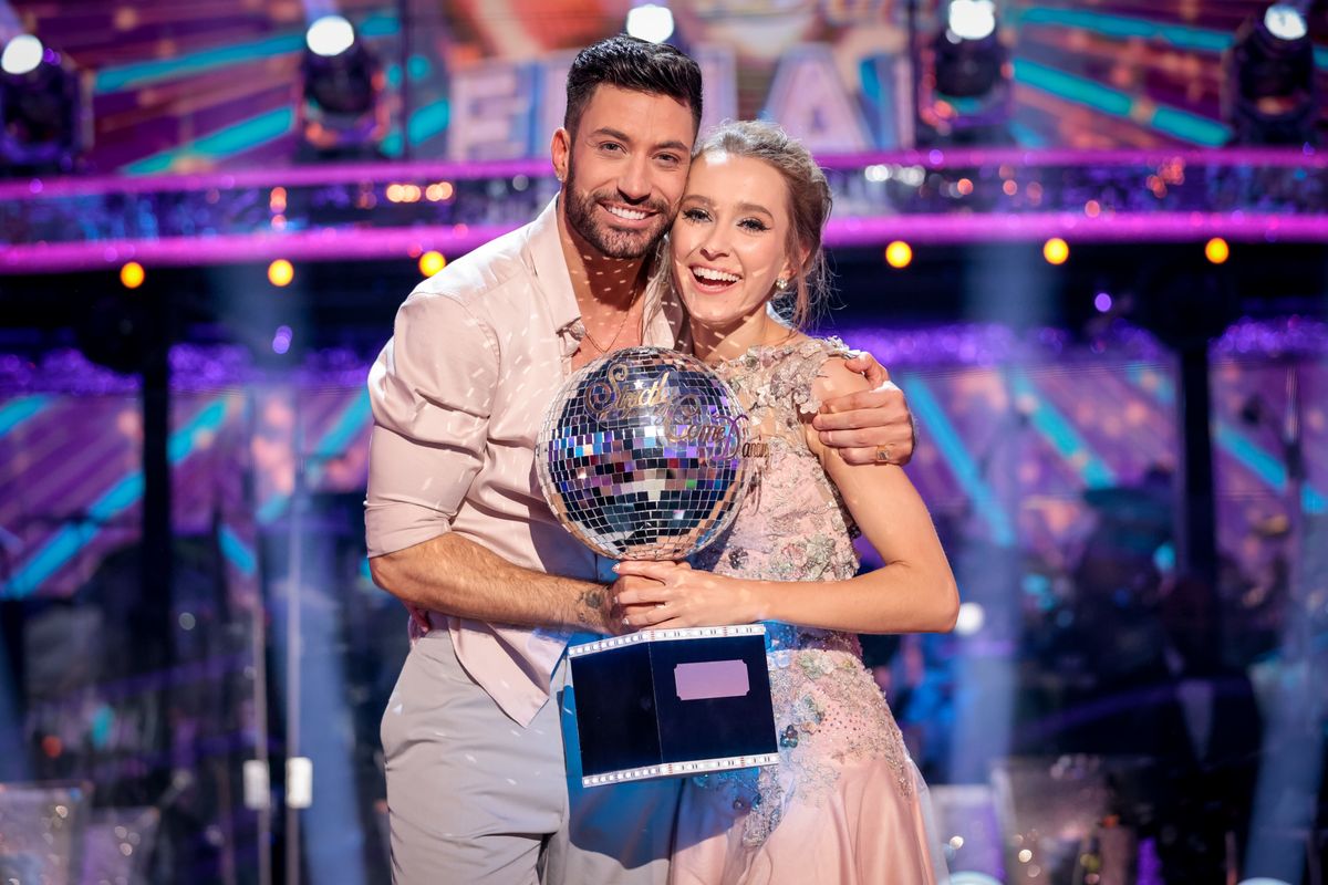 Strictly Come Dancing 2021 winners Giovanni and Rose holding the glitterball trophy