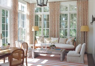 sunroom ideas with patterned rug and curtains