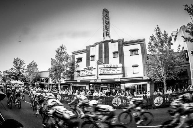 The race passes by the old Tower Theater.