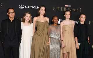 US actress Angelina Jolie and her children (L-R) Maddox, Vivienne, Zahara, Shiloh and Knox arrive for the world premiere of Marvel Studios' "Eternals" at the Dolby theatre in Los Angeles