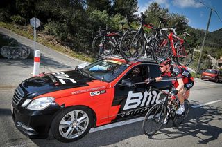 Ben Hermans talk with BMC director Fabio Baldato during stage 6 at Paris-Nice.