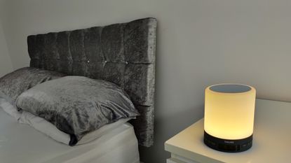 Beurer WL50 Wake Up Light on a bedside table next to bed