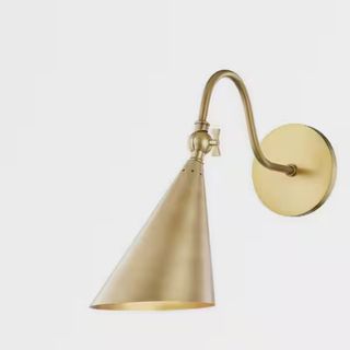 A brass wall sconce from The Home Depot