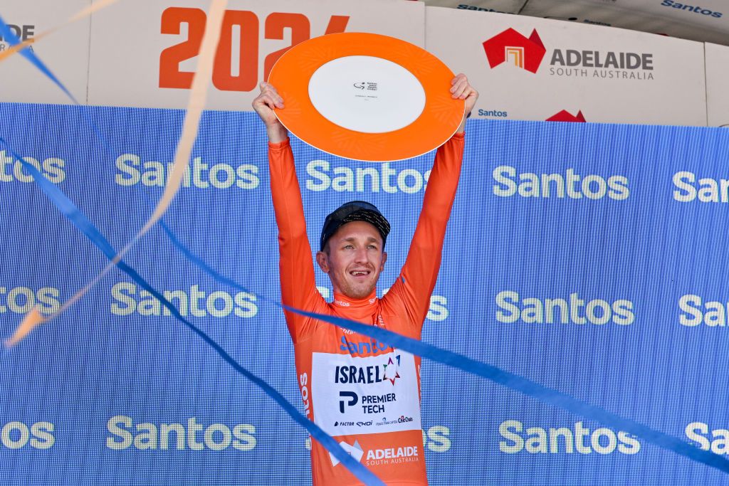 Race winner Israel-Premier Tech's Stephen Williams celebrates on the podium