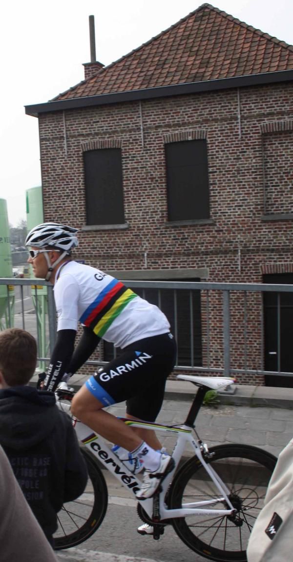 World champion Thor Hushovd (Garmin-Cervelo) rides to the start.