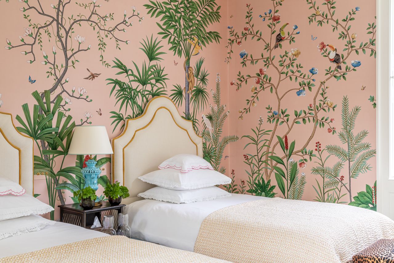 Pink wallpaper in a colorful bedroom