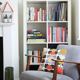 room with bookshelves and armchair