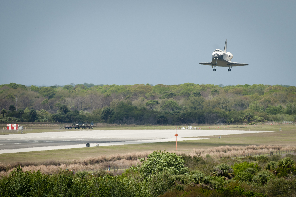 Space shuttle Discovery lands at Kennedy Space Center in Florida to complete its 39th and final flight.