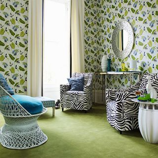 tribal living room with leaf print wallpaper