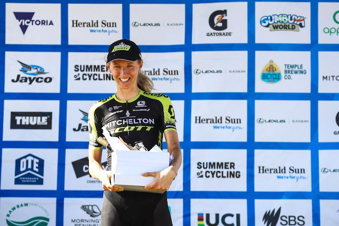 Lucy Kennedy enjoys the spoils of victory on the podium