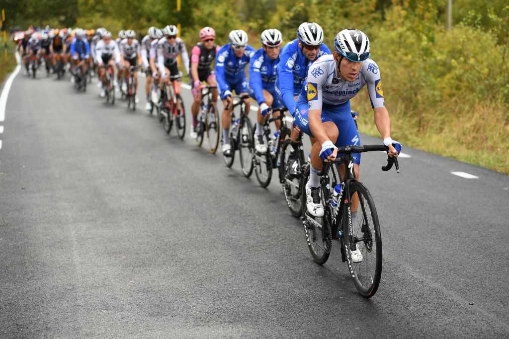ROCCARASO ITALY OCTOBER 11 Davide Ballerini of Italy and Team Deceuninck QuickStep Pieter Serry of Belgium and Team Deceuninck QuickStep Joao Almeida of Portugal and Team Deceuninck QuickStep Pink Leader Jersey Peloton Rain during the 103rd Giro dItalia 2020 Stage 9 a 207km stage from San Salvo to Roccaraso Aremogna 1658m girodiitalia Giro on October 11 2020 in Roccaraso Italy Photo by Tim de WaeleGetty Images