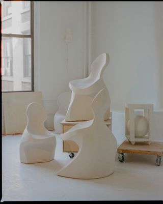 white ceramic chairs by simone bodmer turner