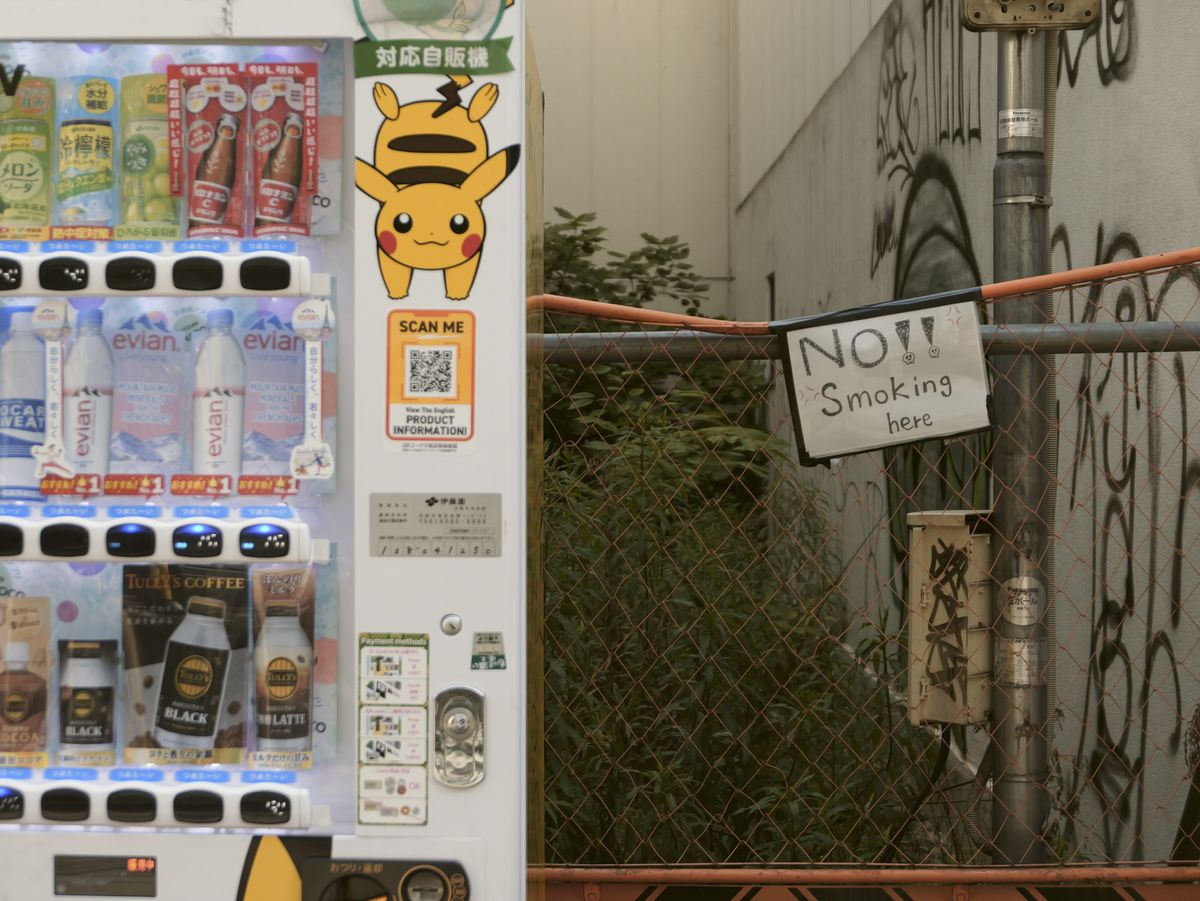 Sample image taken with the Panasonic Lumix L10; a vending machine in Osaka street, with Pokemon picture on it
