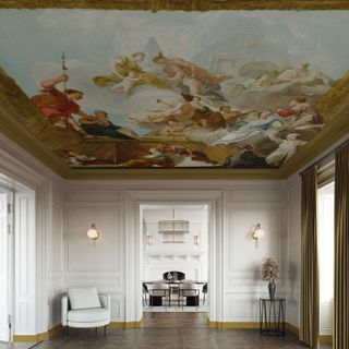 A room with a ceiling mural