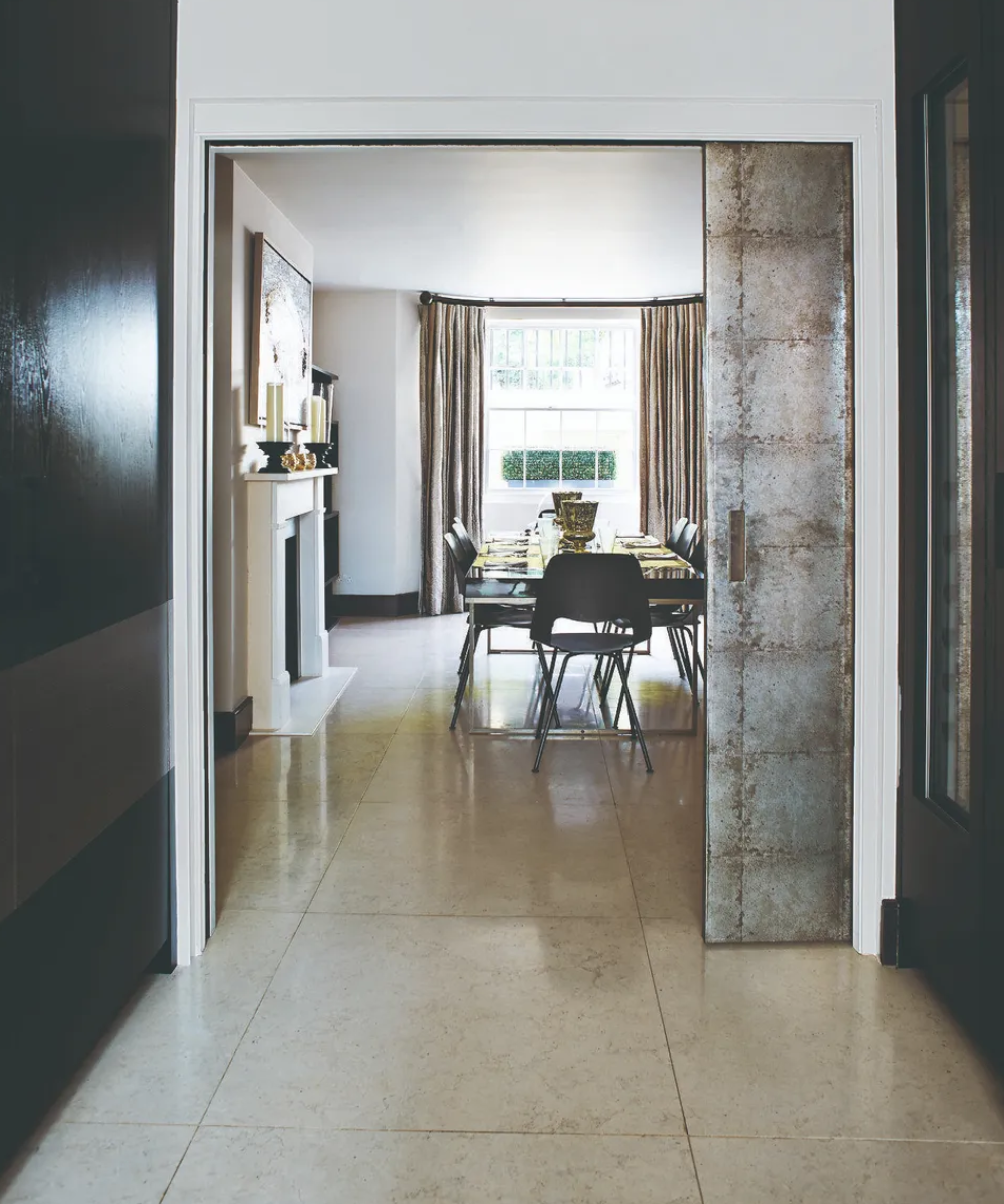 pocket door in front of dining room