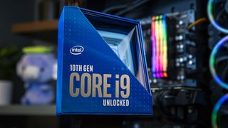 Intel Core i9 10900K box with gaming PC behind