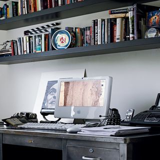 home office with desk and book shelves