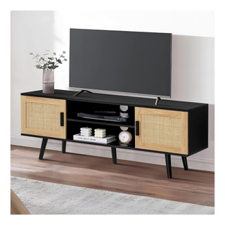 A rattan tv stand with black embellishments