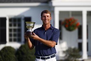Andy Ogletree winning the low amateur trophy at the 2020 Masters