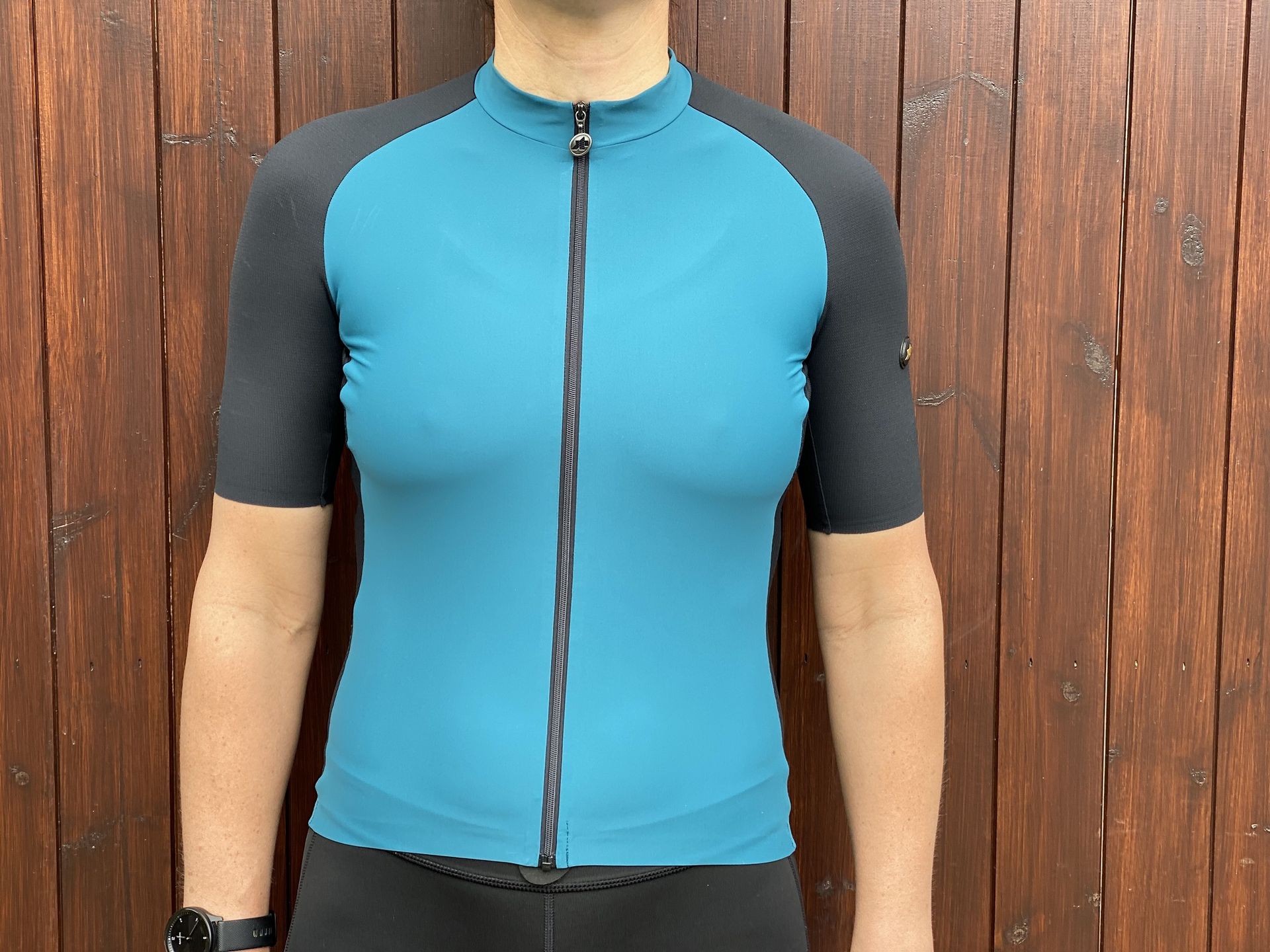 Female cyclist wearing the Assos UMA GTV Jersey C2 which is one of the best women's cycling jerseys