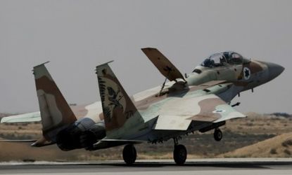 An Israeli air force F-15 fighter jet lands at the Hatzerim air base in Hatzerim southern Israel.