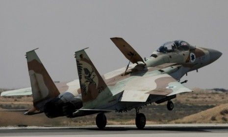 An Israeli air force F-15 fighter jet lands at the Hatzerim air base in Hatzerim southern Israel.