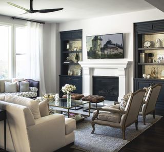 white living room with black bookcases