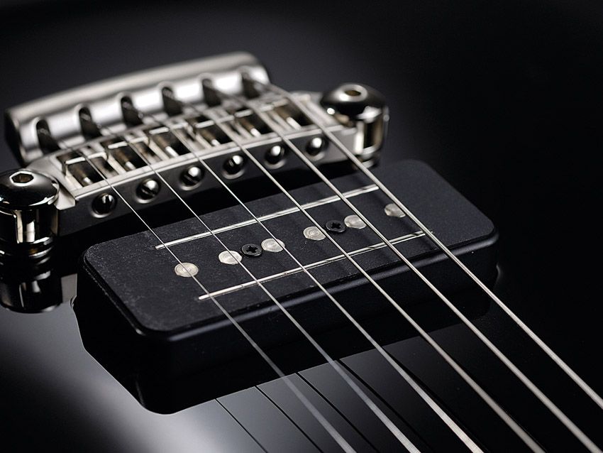 The bridge and pickups have both been redesigned for these guitars.