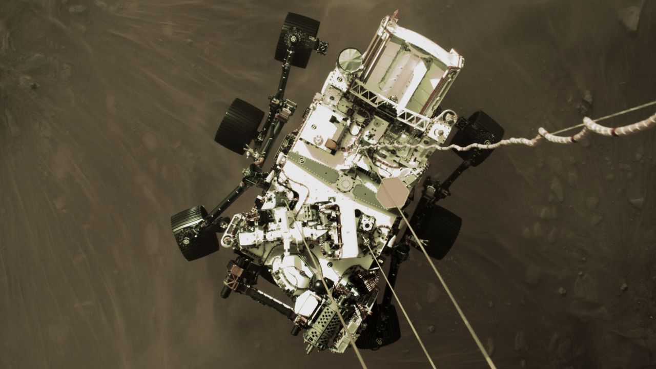 This high-resolution still image is part of a video taken by several cameras as NASA&rsquo;s Perseverance rover touched down on Mars on Feb. 18, 2021. A camera aboard the descent stage captured this shot.
