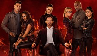 The cast lined up behind Tom Ellis in Hell in Lucifer.