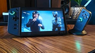Lenovo Legion GO with Robocop: Rogue City on screen and TrueStrike controller detached
