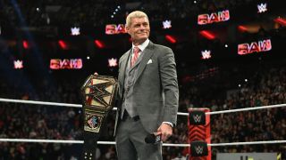 Cody Rhodes stands in the ring holding the WWE Championship on WWE Raw