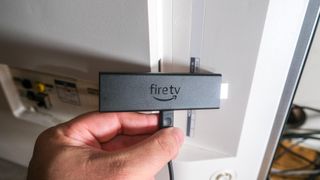 Amazon Fire TV Stick 4K Max behind TV