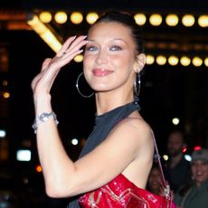Bella Hadid wears a skintight black leotard to Gigi Hadid's 30th birthday party